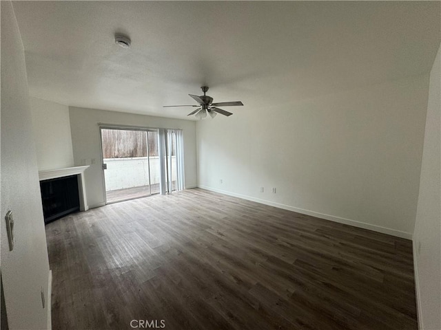 615 Calle Campana, San Clemente, CA 92673 - unfurnished living room featuring baseboards, a ceiling fan, wood finished floors, and a fireplace