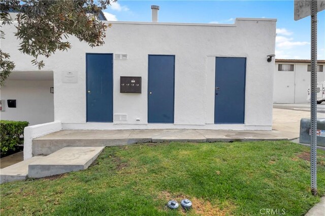 615 Calle Campana, San Clemente, CA 92673 - exterior space featuring a lawn and stucco siding