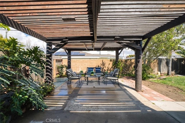 view of patio / terrace featuring a fenced backyard and a pergola