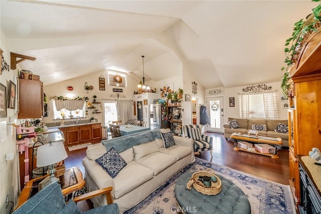 7120 Lyons Ave, Hesperia, CA 92345 - living area featuring high vaulted ceiling and light wood finished floors