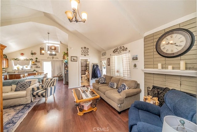 7120 Lyons Ave, Hesperia, CA 92345 - living area featuring vaulted ceiling, wood finished floors, and a chandelier