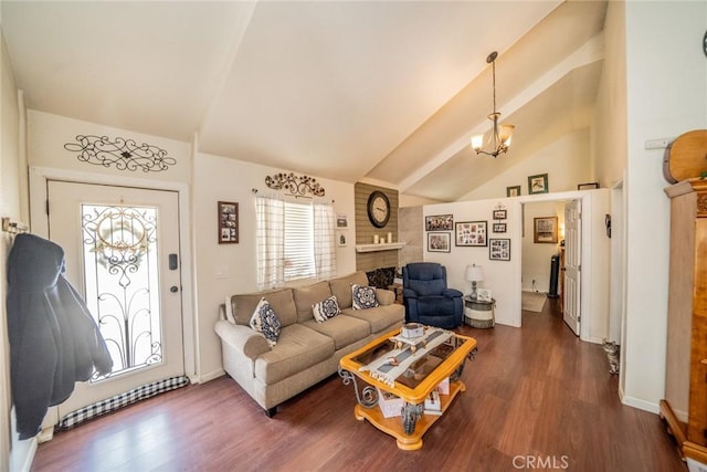 7120 Lyons Ave, Hesperia, CA 92345 - living room with a notable chandelier, dark wood finished floors, lofted ceiling, and a fireplace