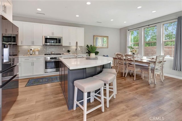 137 Lavender, Lake Forest, CA 92630 - kitchen featuring recessed lighting, light countertops, and appliances with stainless steel finishes