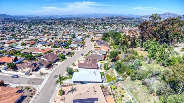 bird's eye view with a mountain view and a residential view