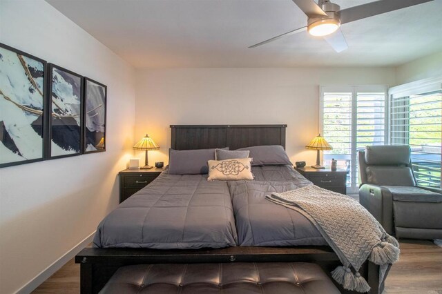 bedroom featuring a ceiling fan and wood finished floors