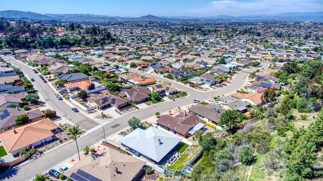 bird's eye view with a residential view and a mountain view