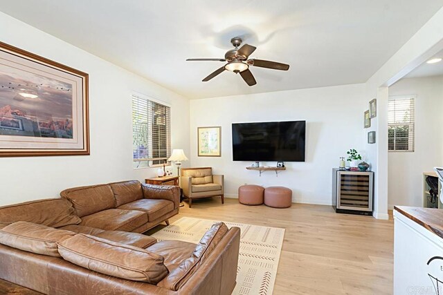 3524 Lone Pine Ln, San Marcos, CA 92078 - living room with a ceiling fan, light wood-style flooring, wine cooler, and a wealth of natural light