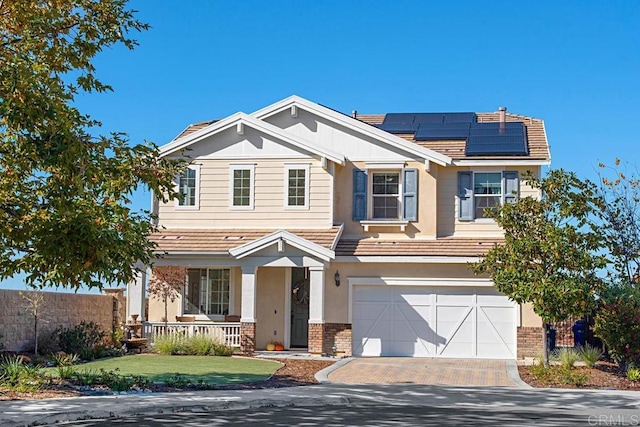 3524 Lone Pine Ln, San Marcos, CA 92078 - view of front facade with a porch, solar panels, a garage, brick siding, and stucco siding