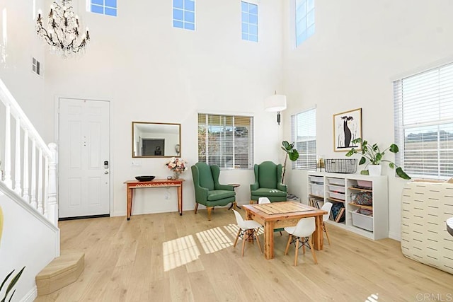 3524 Lone Pine Ln, San Marcos, CA 92078 - living area featuring stairs, plenty of natural light, wood finished floors, and a towering ceiling