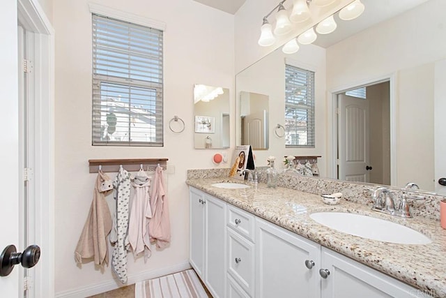 3524 Lone Pine Ln, San Marcos, CA 92078 - bathroom with a sink, baseboards, and double vanity
