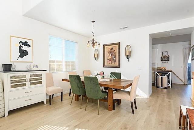 3524 Lone Pine Ln, San Marcos, CA 92078 - dining room with baseboards, an inviting chandelier, visible vents, and light wood-type flooring
