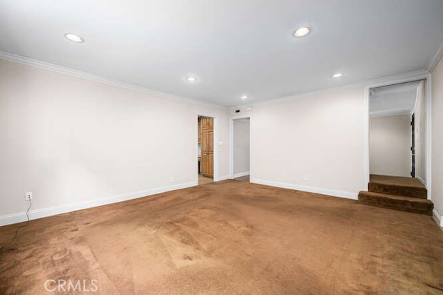 interior space with recessed lighting, ornamental molding, and baseboards