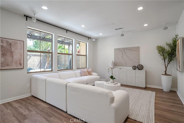 125 Annuals, Irvine, CA 92618 - living area featuring recessed lighting, baseboards, visible vents, and wood finished floors