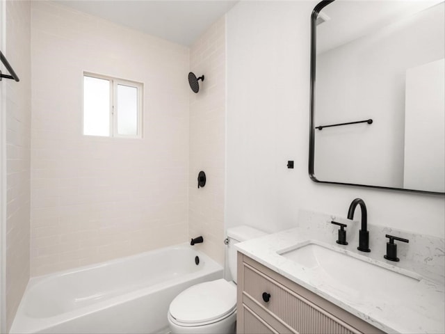 bathroom with vanity,  shower combination, and toilet