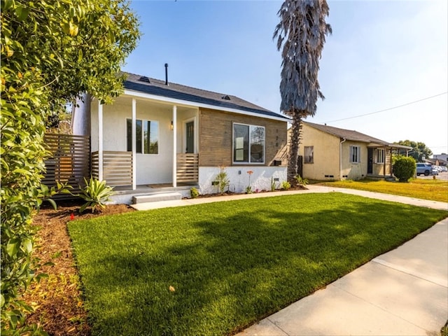 view of front of house with a front yard