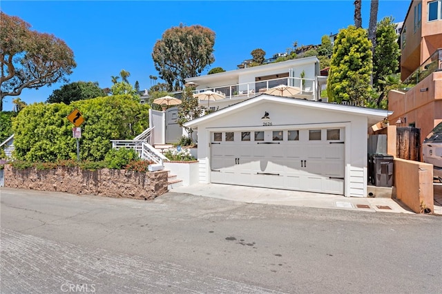 view of front of property featuring a garage