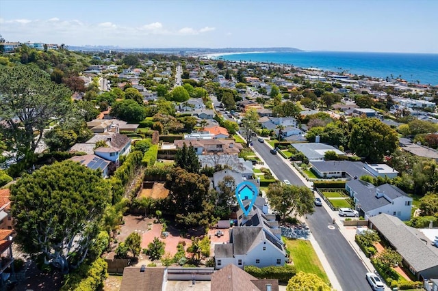 bird's eye view featuring a water view and a residential view