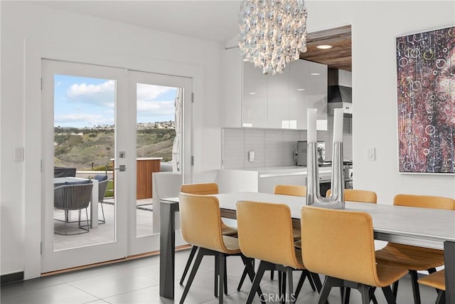 303 Calle Paisano, San Clemente, CA 92673 - dining area featuring an inviting chandelier and light tile patterned flooring