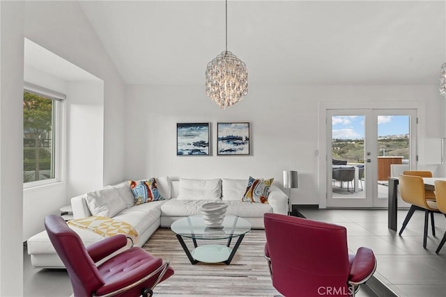 303 Calle Paisano, San Clemente, CA 92673 - living area featuring an inviting chandelier, plenty of natural light, and french doors