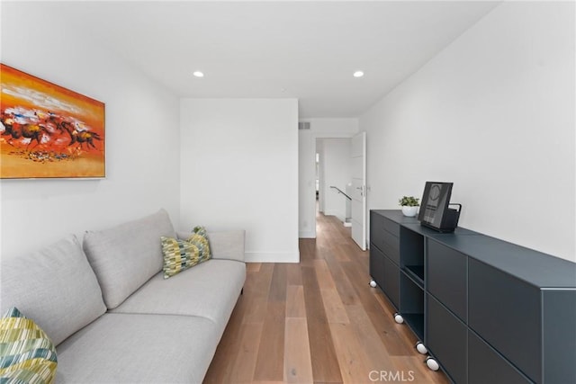 303 Calle Paisano, San Clemente, CA 92673 - living room featuring recessed lighting, visible vents, and wood finished floors