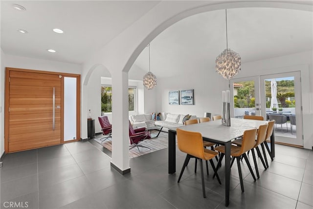 303 Calle Paisano, San Clemente, CA 92673 - dining area featuring arched walkways, lofted ceiling, a chandelier, and recessed lighting