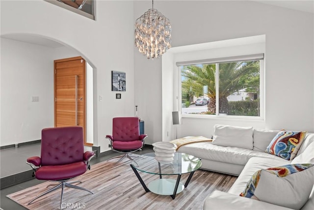 303 Calle Paisano, San Clemente, CA 92673 - living room featuring an inviting chandelier and arched walkways