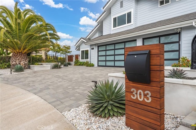 303 Calle Paisano, San Clemente, CA 92673 - exterior space with an attached garage and driveway