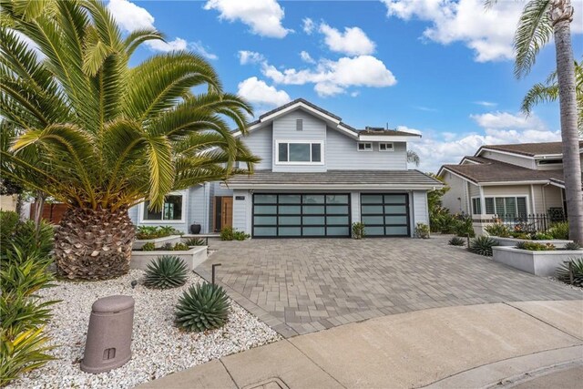 303 Calle Paisano, San Clemente, CA 92673 - view of front of property with an attached garage and decorative driveway