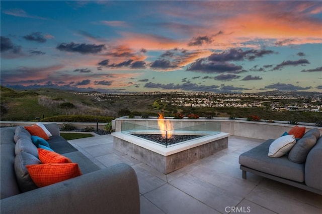 303 Calle Paisano, San Clemente, CA 92673 - patio terrace at dusk with an outdoor living space with a fire pit