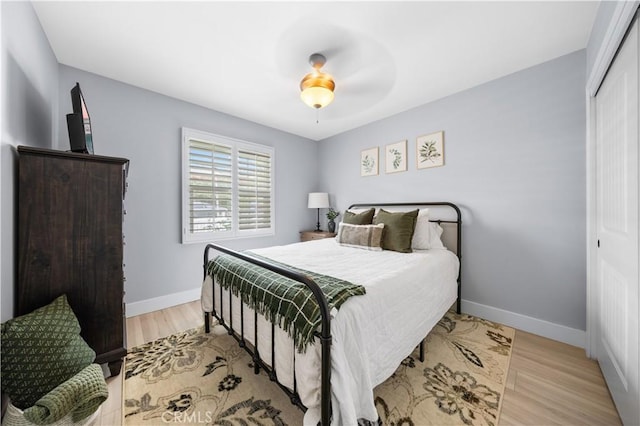 24052 Estacia Ave, Laguna Niguel, CA 92677 - bedroom featuring a closet, baseboards, and light wood finished floors