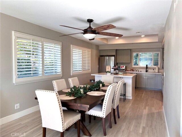 24052 Estacia Ave, Laguna Niguel, CA 92677 - dining area with baseboards, recessed lighting, light wood-style floors, and ceiling fan