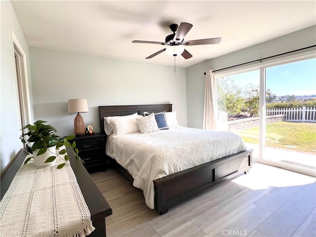 24052 Estacia Ave, Laguna Niguel, CA 92677 - bedroom featuring access to outside, a ceiling fan, and light wood-style floors