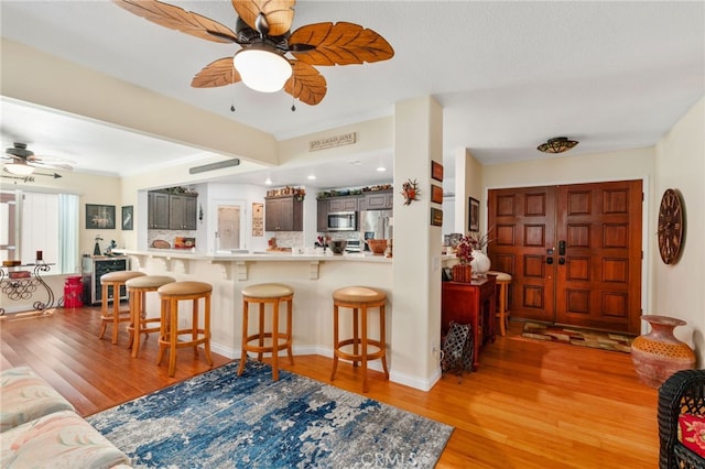 1316 Via Ln, Ranchita, San Marcos, CA 92069 - living area featuring light wood-style floors and ceiling fan