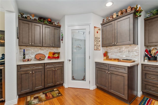 1316 Via Ln, Ranchita, San Marcos, CA 92069 - bar with recessed lighting, decorative backsplash, and light wood-style flooring