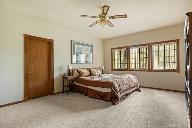 32424 Snowshoe Ln, Running Springs, CA 92382 - carpeted bedroom featuring baseboards and a ceiling fan