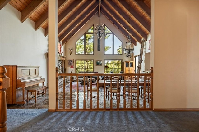 32424 Snowshoe Ln, Running Springs, CA 92382 - sunroom / solarium featuring beamed ceiling and a chandelier