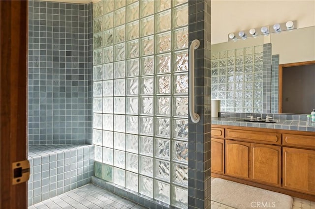 32424 Snowshoe Ln, Running Springs, CA 92382 - bathroom featuring a walk in shower, tile patterned floors, and vanity