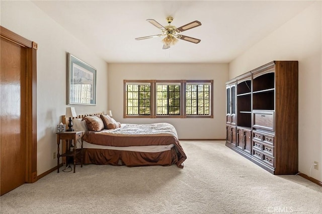 32424 Snowshoe Ln, Running Springs, CA 92382 - bedroom with baseboards, a ceiling fan, and light carpet