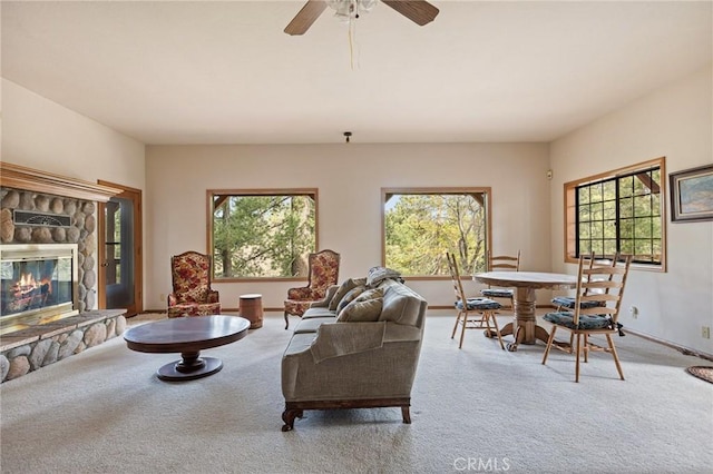 32424 Snowshoe Ln, Running Springs, CA 92382 - carpeted living room featuring baseboards, a ceiling fan, and a fireplace