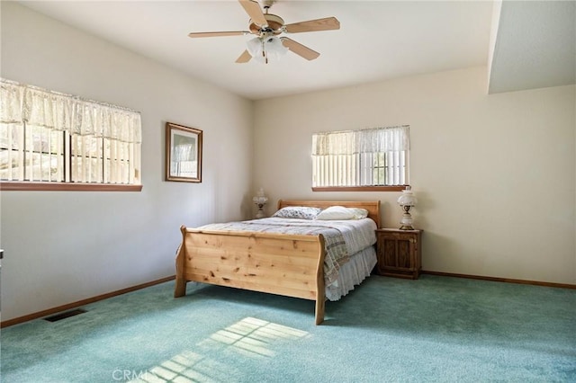 32424 Snowshoe Ln, Running Springs, CA 92382 - carpeted bedroom featuring baseboards, multiple windows, and visible vents