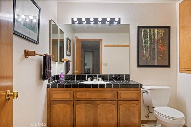 32424 Snowshoe Ln, Running Springs, CA 92382 - bathroom featuring toilet and vanity