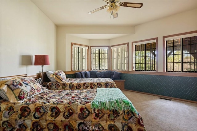 32424 Snowshoe Ln, Running Springs, CA 92382 - carpeted bedroom with visible vents and a ceiling fan