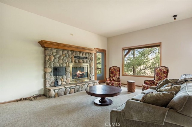 32424 Snowshoe Ln, Running Springs, CA 92382 - carpeted living room with baseboards and a fireplace