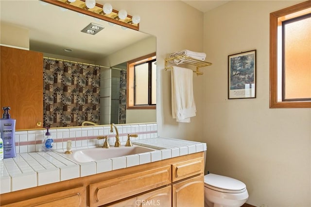 32424 Snowshoe Ln, Running Springs, CA 92382 - bathroom with vanity, toilet, and curtained shower