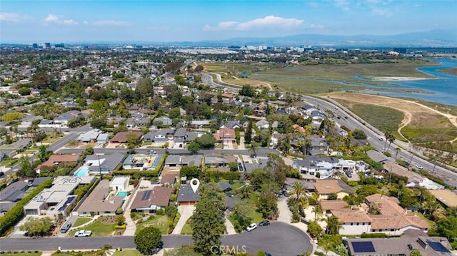 aerial view with a residential view and a water view
