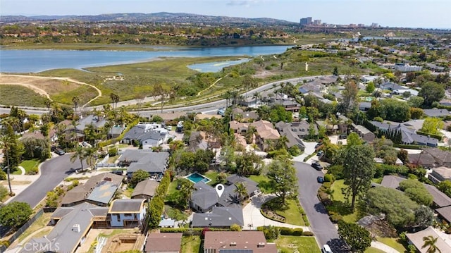 aerial view featuring a residential view and a water view