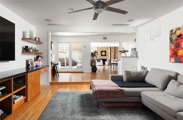 2516 Vista Baya, Newport Beach, CA 92660 - living room featuring a ceiling fan, light wood-style flooring, and visible vents