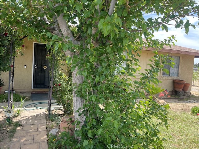 40964 156th St E, Lancaster, CA 93535 - property entrance featuring stucco siding