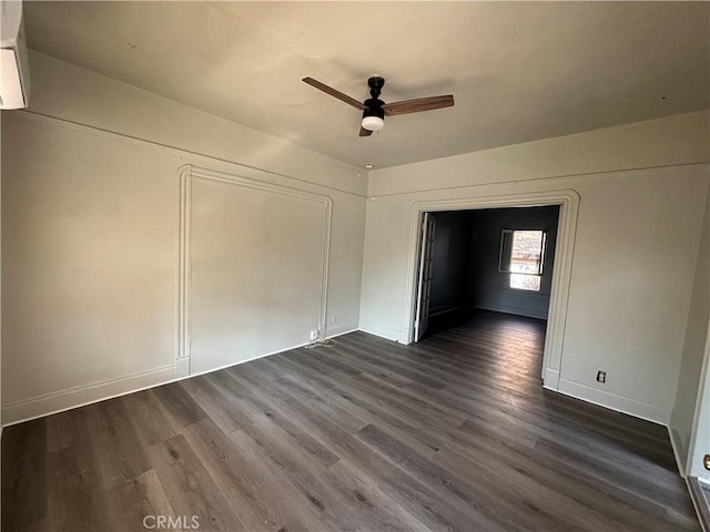 3499 Lemon St, Riverside, CA 92501 - unfurnished bedroom with baseboards, dark wood-style flooring, and ceiling fan