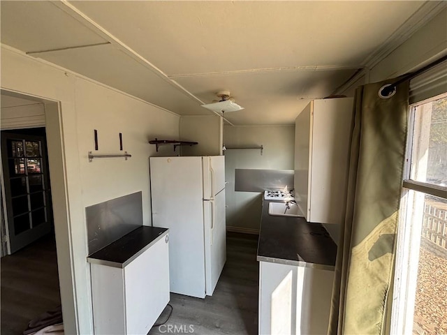 3499 Lemon St, Riverside, CA 92501 - kitchen featuring freestanding refrigerator and dark wood-style floors